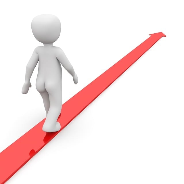 3D white humanoid figure walking forward on a red arrow pointing upward, symbolizing progress, direction, or growth.